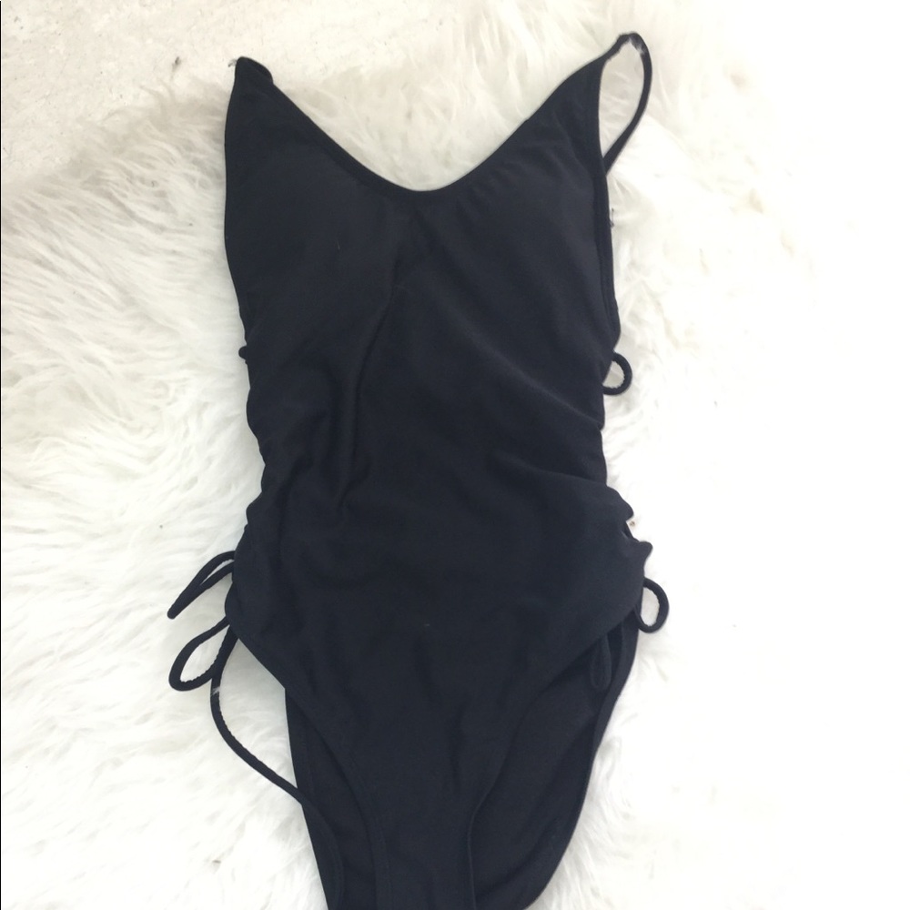 One piece swim suit with lace up side